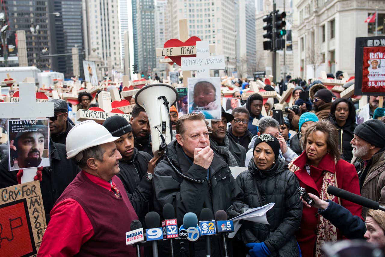 Father Michael Pfleger speaks at a peace march on Dec. 31, 2016, to remember the lives of over 750 people lost to violence in Chicago during 2016.