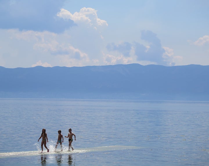 Children playing at Lake Ohrid, Albania  