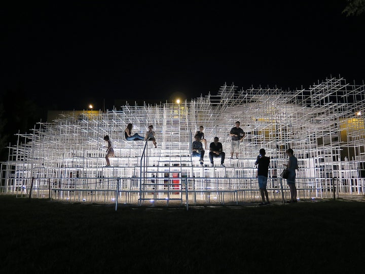 People out and about at night in Tirana, capital of Albania