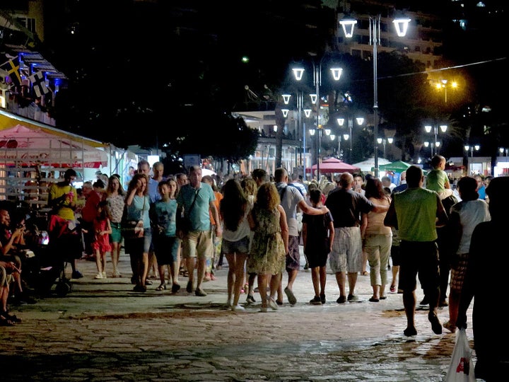 <p><em>Strolling the promenade in the evening in Saranda</em></p>