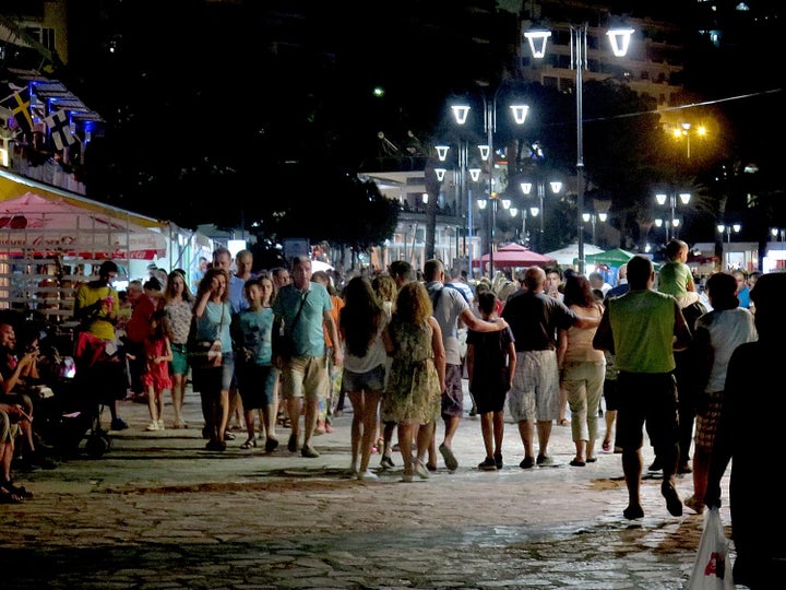 Strolling the promenade in the evening in Saranda