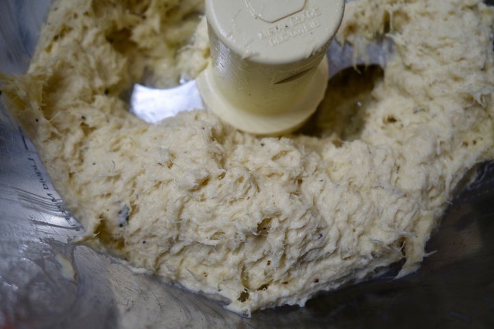 <p>In the food processor with a couple of tablespoons of the cooking liquid</p>