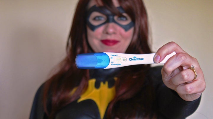 Batgirl's got a bun in the oven.