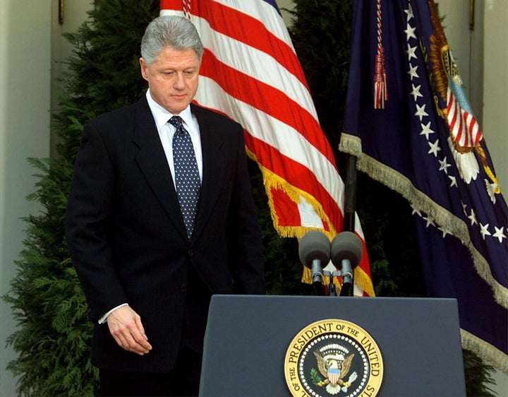 President Bill Clinton prepares to read a statement at the White House after the Senate voted not to convict him Feb. 12, 199