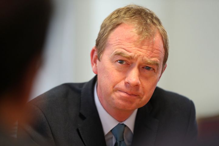 Liberal Democrat leader Tim Farron speaks to staff during a visit to the National Pharmacy Association in St Albans, on the general election campaign trail.