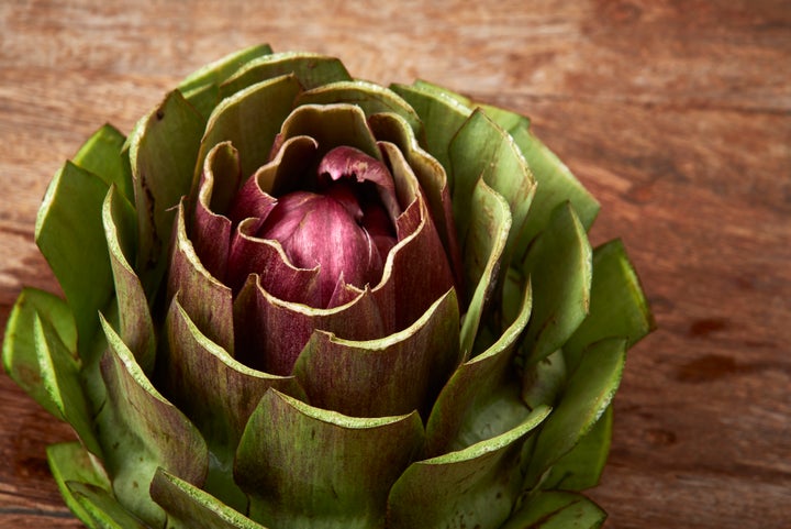 An artichoke that's been tamed by a kitchen knife.