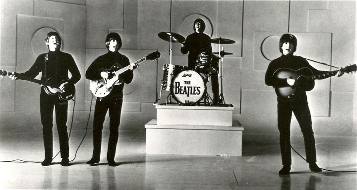 The Fab Four, complete with Beatle haircuts.