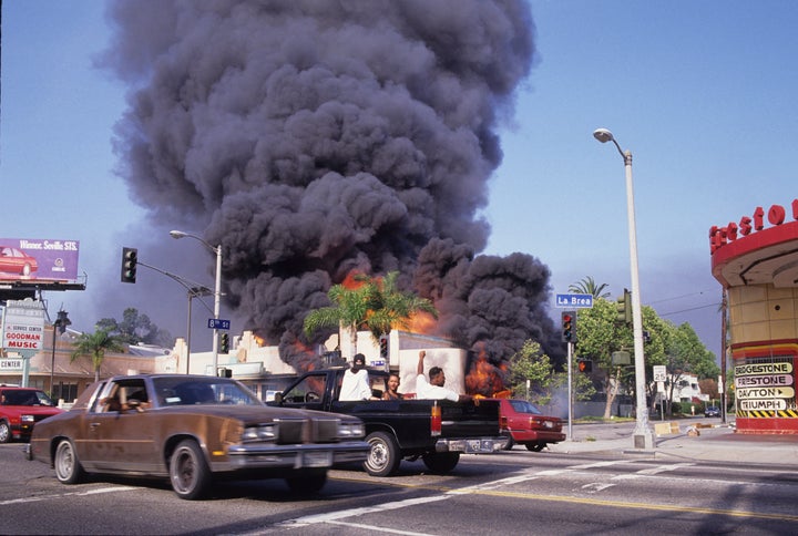 A building burns in downtown Los Angeles, 1992.