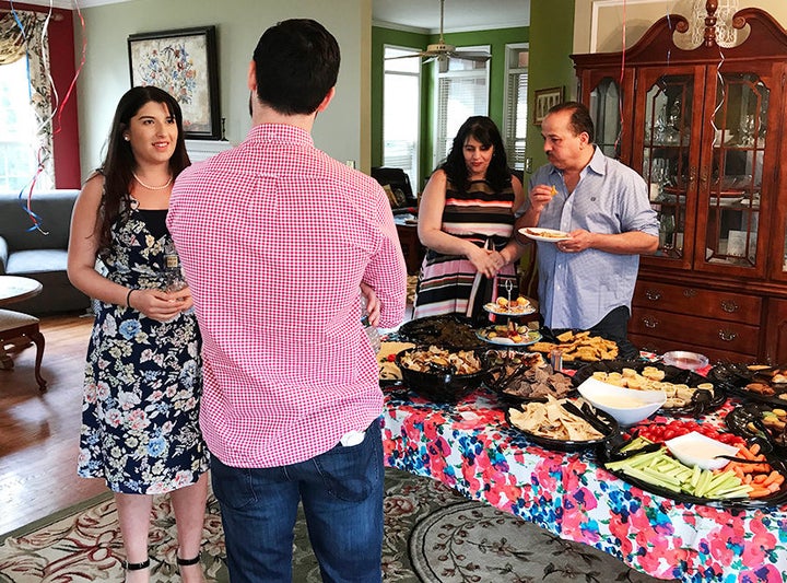 Risheq talks to a supporter at her campaign launch party. 