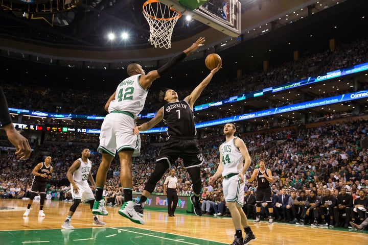 Jeremy Lin of the Brooklyn Nets drives to the basket against the Boston Celtics on April 10 in Boston.