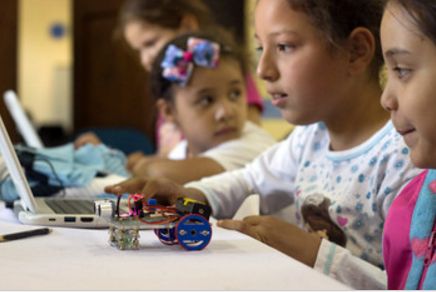 Girls in Paraguay building a robot