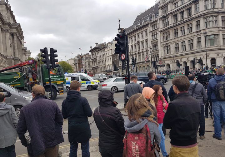 Crowds gathered at the end of Whitehall in central London which was closed by police