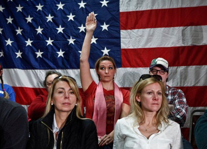 A woman raises her hand during a Town Hall meeting with New Jersey Gov. Chris Christie on Feb. 19, 2014 in Middletown, N.J, from Merrill Fabry, “This Is How the Town Hall Meeting Became a Campaign-Season Staple,” Time, Jan 22, 2016, http://time.com/4190233/town-hall-meeting-history/.