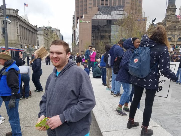 Ben loves reading, and he really seems to be enjoying the various signs at the Cleveland Science March and Rally. 