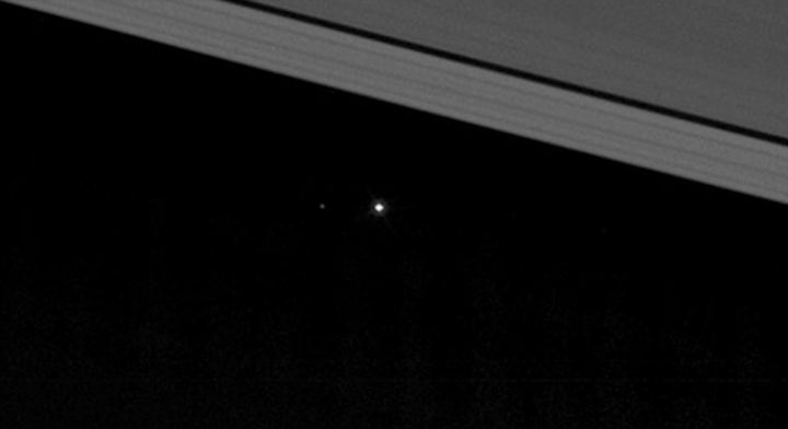 In this zoomed-in image of the previous picture, the moon can be seen to the left of Earth.