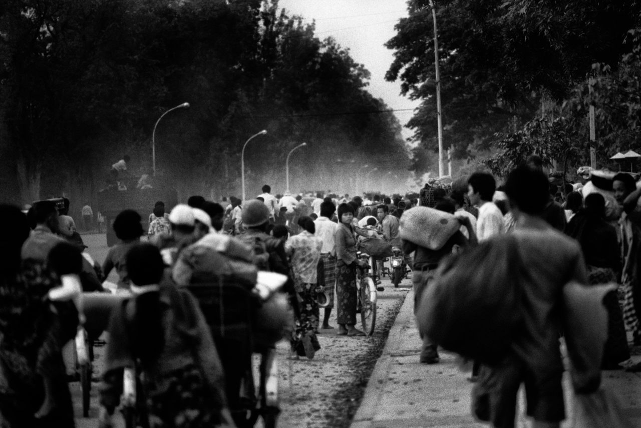 In April 1975, Khmer Rouge rebels ended the Cambodian civil war and gained control of most of the country. Their regime was one of the deadliest in modern history. In the image above, thousands of people flee as Khmer Rouge fighters close in on Phnom Penh, the Cambodian capital.