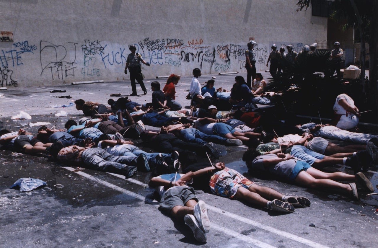 Los Angeles County Sheriff's Department officers surround alleged looters on Vermont at Martin Luther King Jr. Boulevard on April 30, 1992.