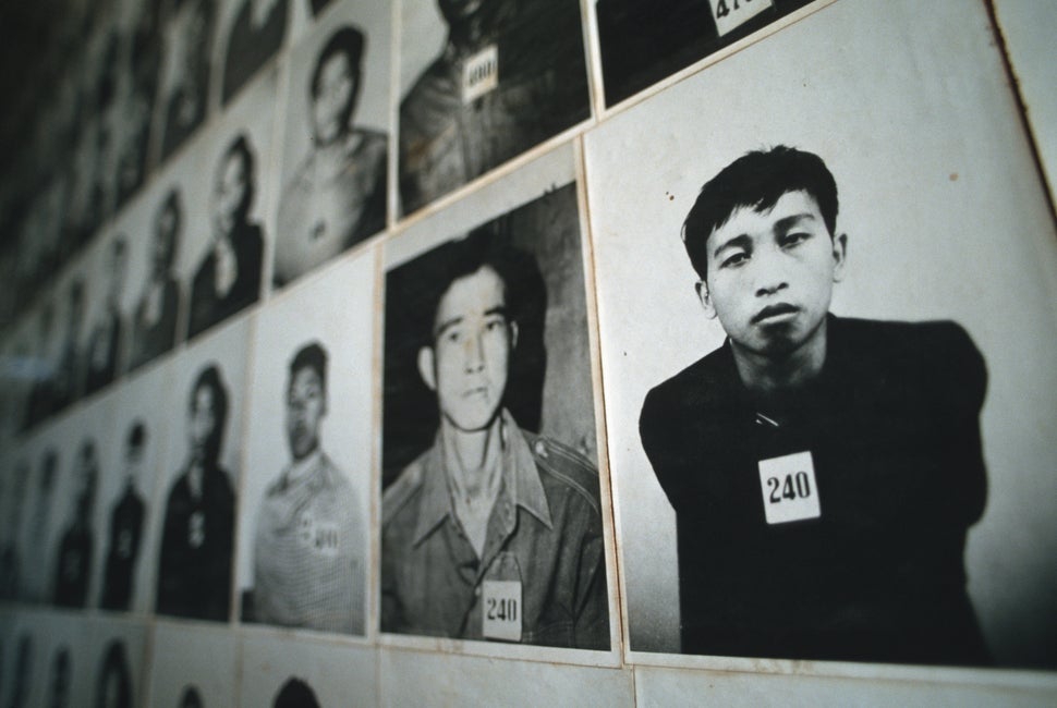 Hundreds of photographs of prisoners line the walls of the Tuol Sleng Museum in Phnom Penh. The museum is in a former school