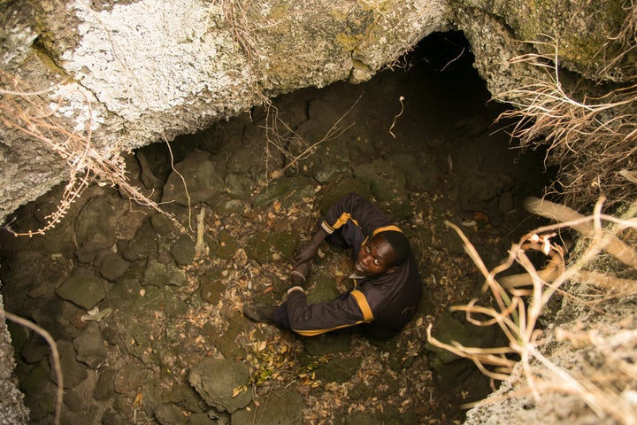 Amos Kiptui, 27, sits in a cave in a remote part of Kenya where an outbreak of cutaneous leishmaniasis has plagued the local community. He is among those afflicted with the flesh-eating disease.