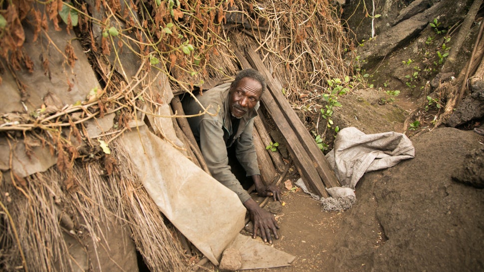 Nearly 300 people live in and around a series of caves in this remote part of central Kenya. It's at least an hour's trek to