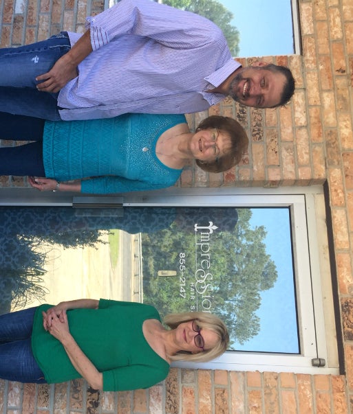 Lane and Flo Matte (left), and Vicky Dupuis outside Impressions Hair Salon.