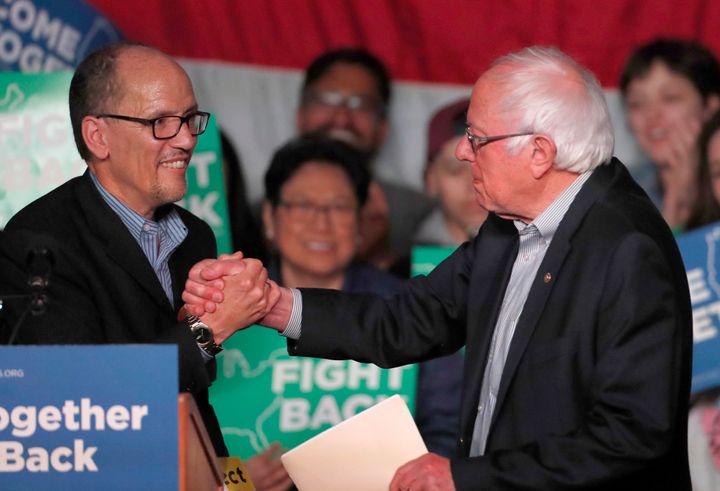 DNC chair Tom Perez, left, greets Sen. Bernie Sanders (I-Vt.) at a rally in Salt Lake City on April 21, 2017. The event was part of a tour marred by controversy over abortion.