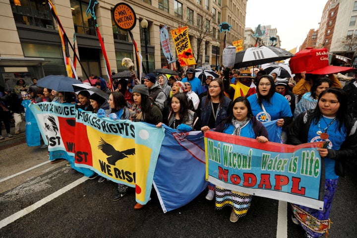 Members of the Standing Rock Sioux Nation and Indigenous leaders participate in a protest march and rally in opposition to the Dakota Access and Keystone XL pipelines in Washington, U.S., on March 10, 2017.