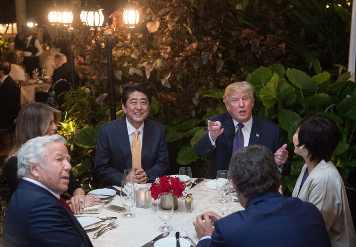 New England Patriots owner Robert Kraft, first lady Melania Trump, Japanese Prime Minister Shinzo Abe, President Donald Trump and Abe's wife, Akie Abe, dine together at Trump's Mar-a-Lago resort on Feb. 10.