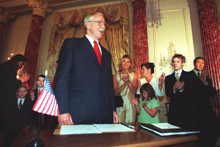 Friends and family applaud James Hormel after he's sworn in as the U.S. Ambassador to Luxembourg in 1999.