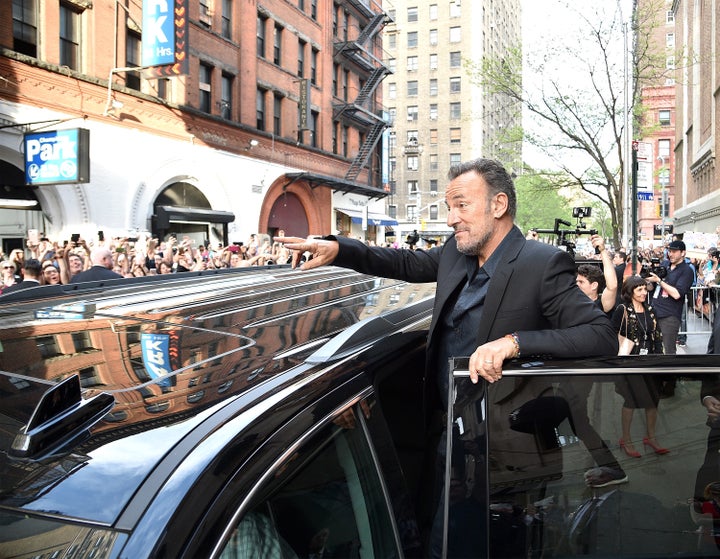 Bruce Springsteen waves to fans after Tribeca Talks: Bruce Springsteen And Tom Hanks on April 28, 2017 in New York City.