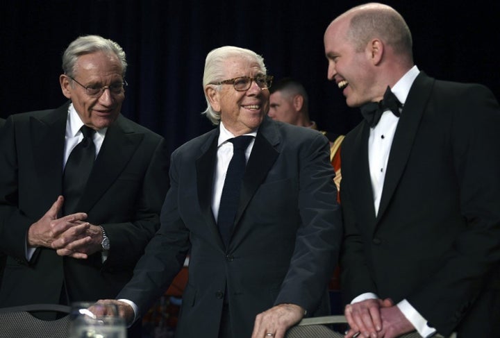 Bob Woodward (left), and Carl Bernstein appear at the White House Correspondents’ dinner with its President, Jeff Mason of Re