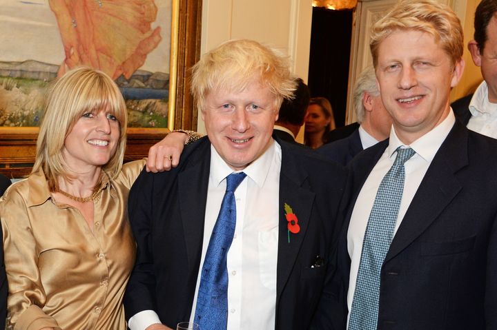(L to R) Rachel Johnson, Boris Johnson and Jo Johnson attend the launch of Boris Johnson's book 'The Churchill Factor: How One Man Made History' on October 22, 2014.