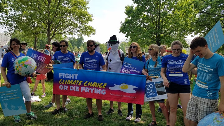 (l) Director Dee Lawrence leads cooleffect.org of San Francisco at the Peoples Climate March in D.C. 