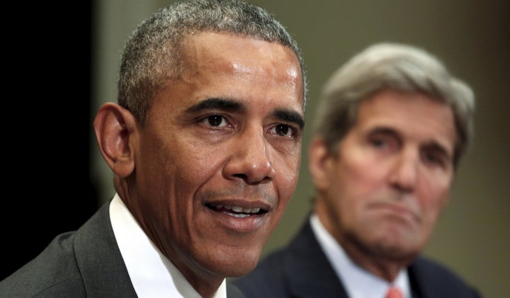 Secretary of State John Kerry listens as President Barack Obama meets with a group of veterans and Gold Star Mothers to discu
