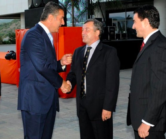 <p>Milo Djukanovic (left) with Veselin Vukotic (center). </p>
