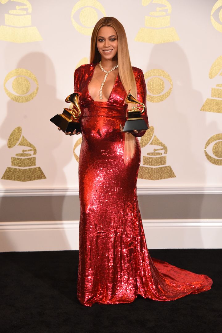 Beyoncé poses for photographs backstage at the Grammy Awards on Feb. 12. 
