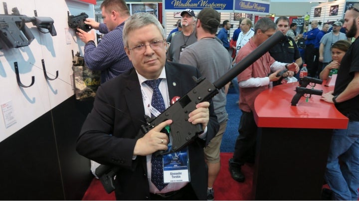 <p>Alexander Torshin samples the wares at the NRA’s 2016 annual meeting in Louisville, Kentucky.</p>