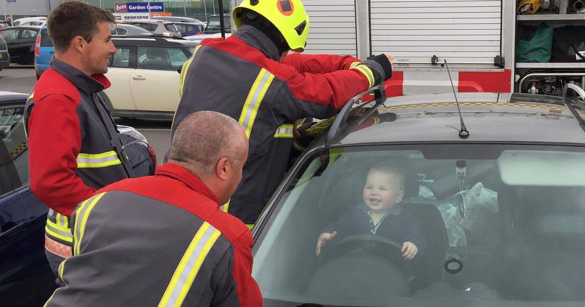 Toddler Looks Delighted As Firefighters Try To Free Him From Locked Car ...
