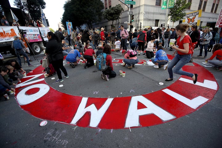 Protesters in San Francisco denounced President Donald Trump's plan to build a wall on the U.S. border with Mexico.