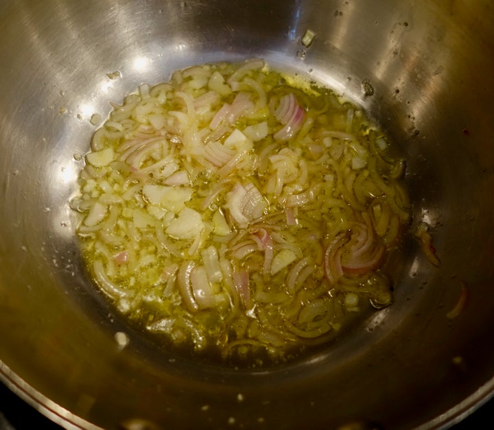 <p>Shallot and garlic in plenty of olive oil</p>