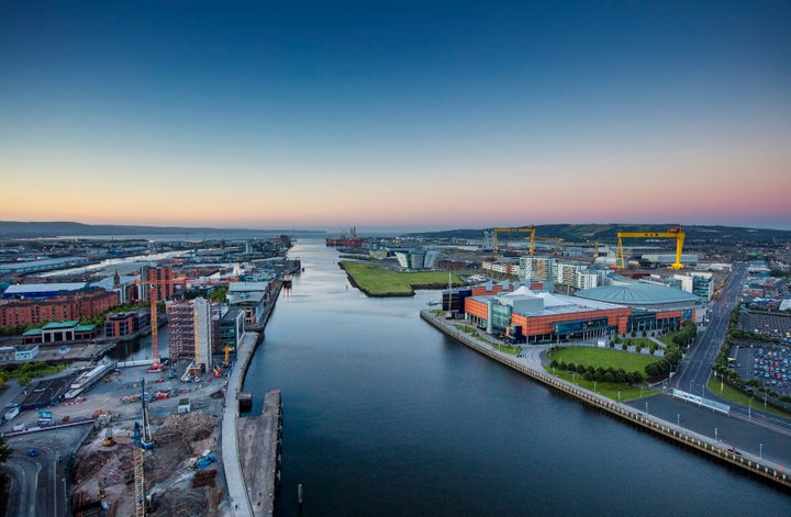 Belfast’s Clarendon Dock area on the River Lagan. The iconic “Samson and Goliath” gantry cranes on right.