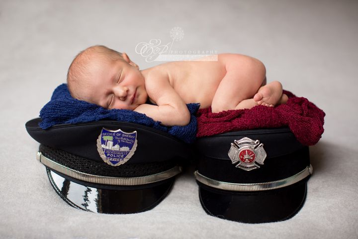 Photographer Erica Posluszny of EP Photography captured 1-month-old Enzo Anthony Crnolic posing with elements of his parents’ uniforms.