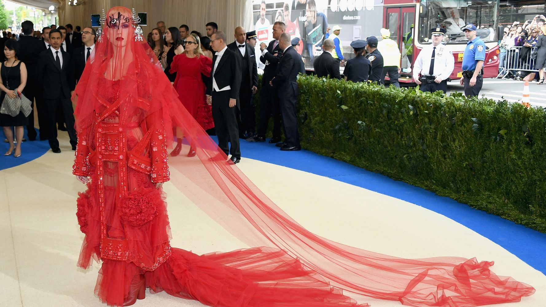Yes, That's Katy Perry Hiding Under All That Red At The Met Gala | HuffPost Life