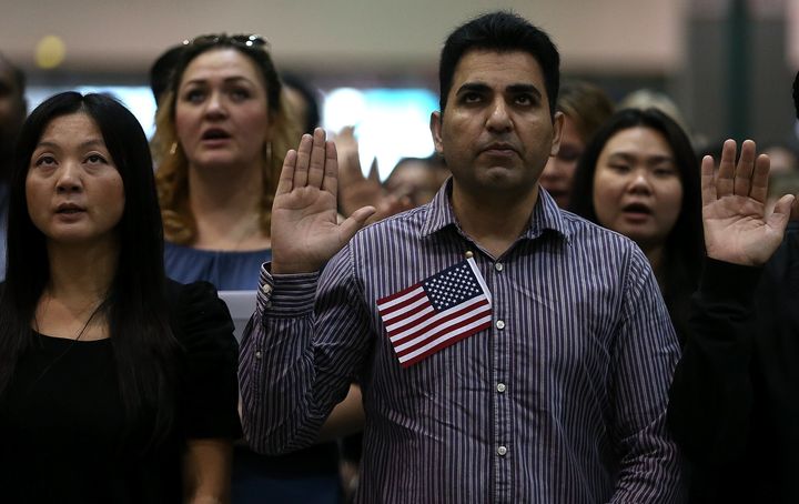 Immigrants are sworn in as U.S. citizens during a naturalization ceremony in 2017 in Los Angeles.