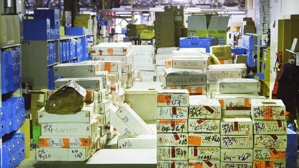 Stacks of untested rape kits in a storage facility.