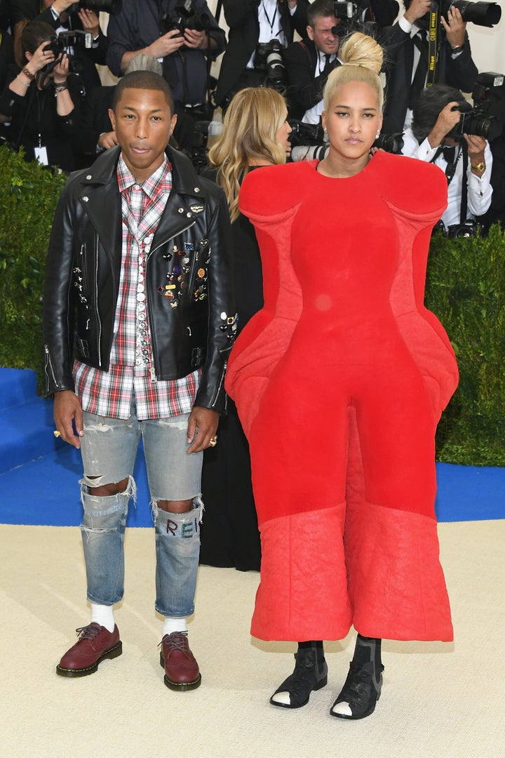 Pharrell Williams and Helen Lasichanh on the Met Gala red carpet