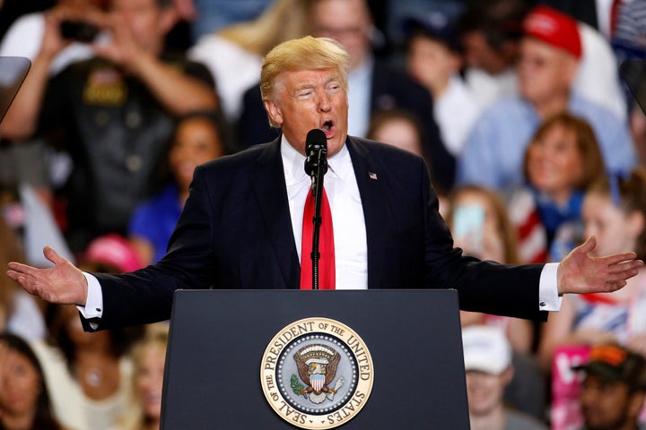 U.S. President Donald Trump appears on stage at a rally in Harrisburg, Pennsylvania, U.S. April 29, 2017.