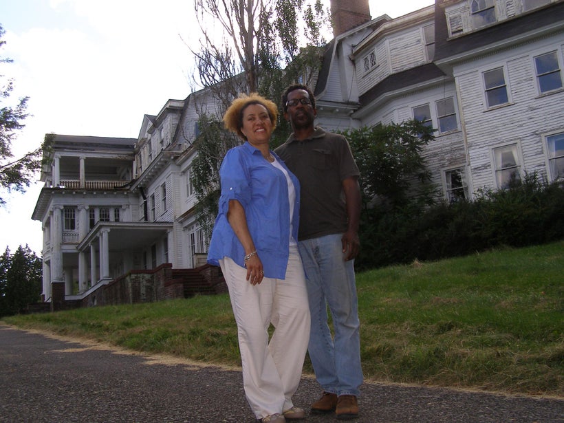 Monique Greenwood and Glenn Pogue in front of <a rel="nofollow" href="http://www.wayneindependent.com/article/20110718/NEWS/3