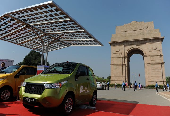 Cars like this electric Mahindra E20 has a range of 100km are expected to become more widespread throughout Indian city centres.