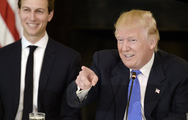 U.S. President Donald Trump speaks while Jared Kushner, senior White House advisor, stands by on Feb. 23.